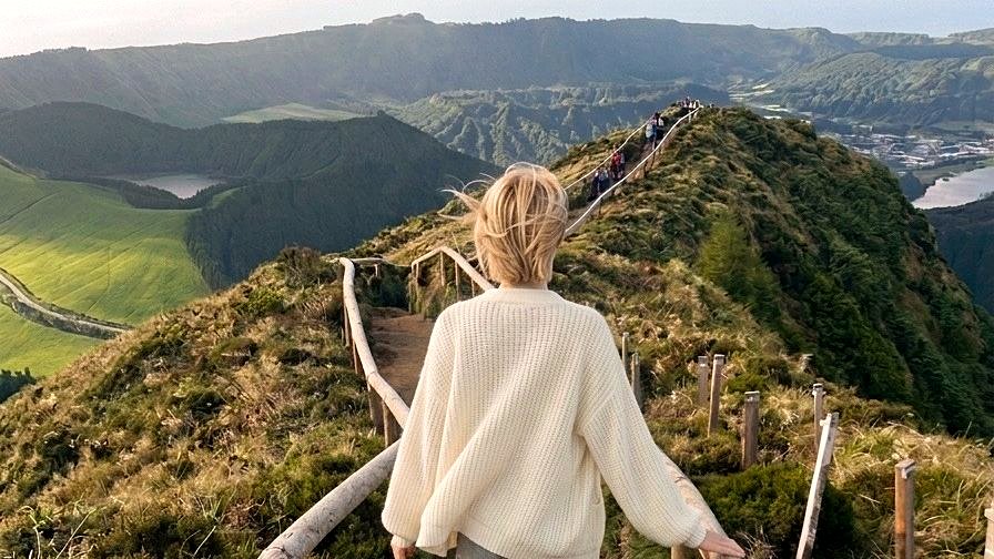Traveler walking to Boca do Inferno viewpoint in Sete Cidades, São Miguel Island, Azores